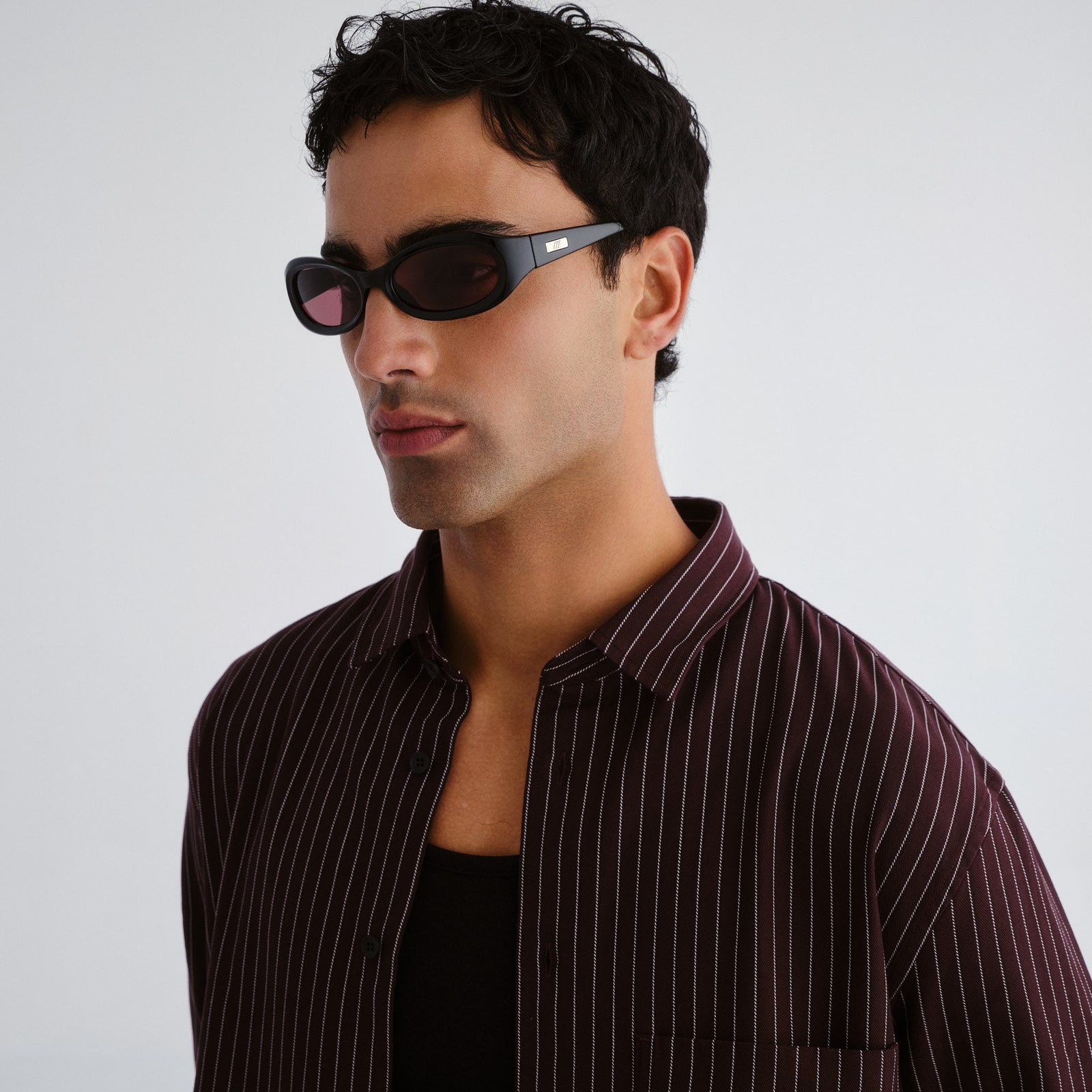 Nightcrawler Black Uni-Sex Oval Sunglasses | Le Specs