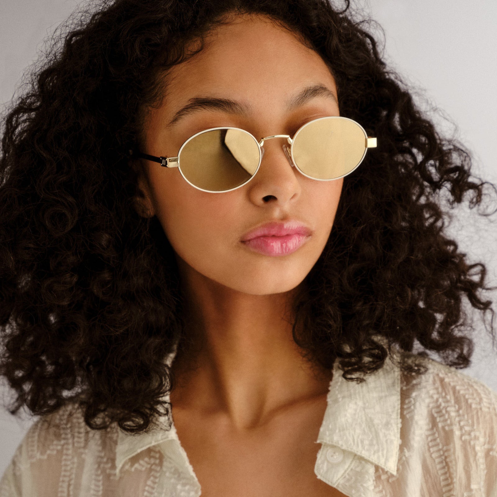 Poseidon Deux Gold Ivory Female Oval Sunglasses | Le Specs
