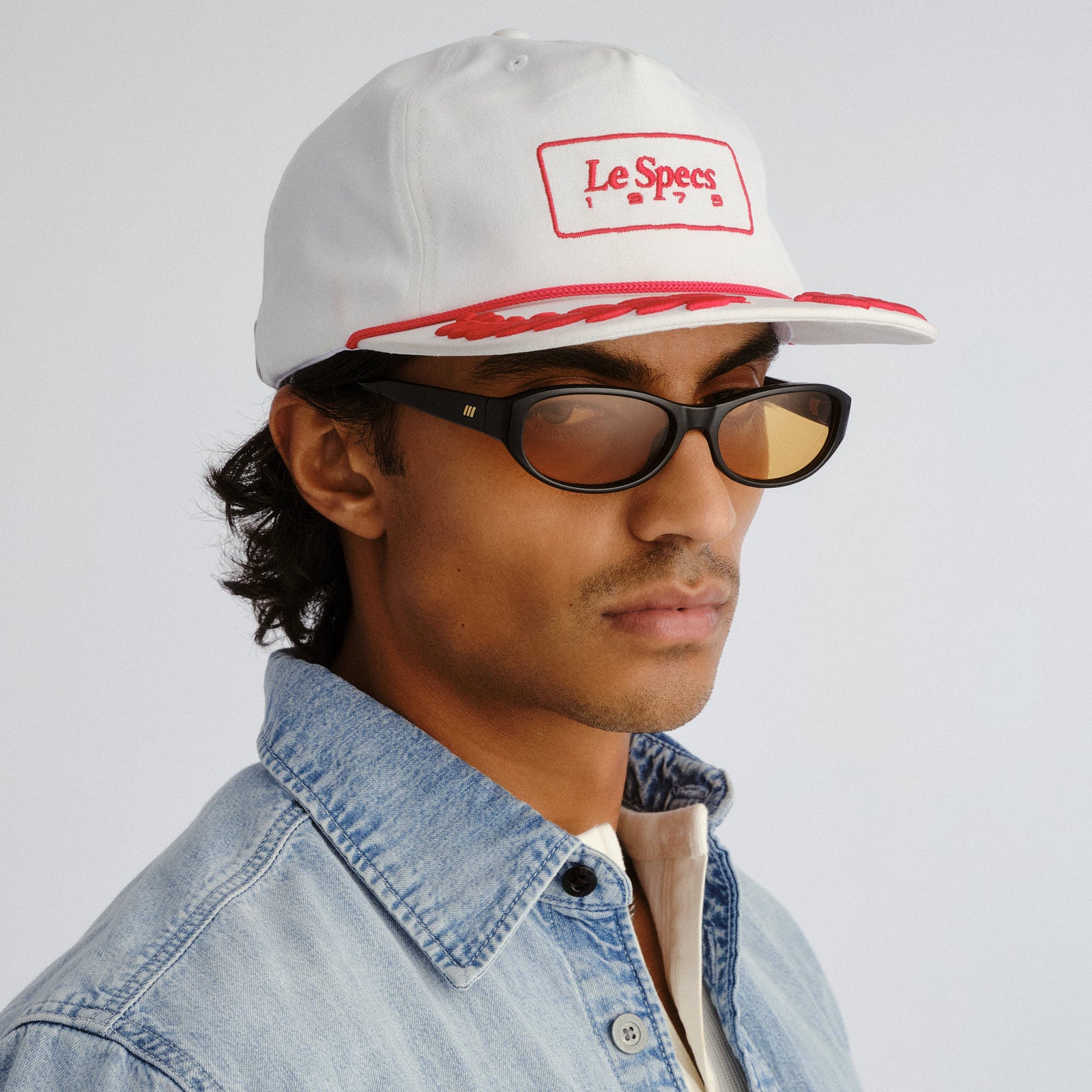 Less26mar8 White Red Uni-Sex Accessories Marketing | Le Specs