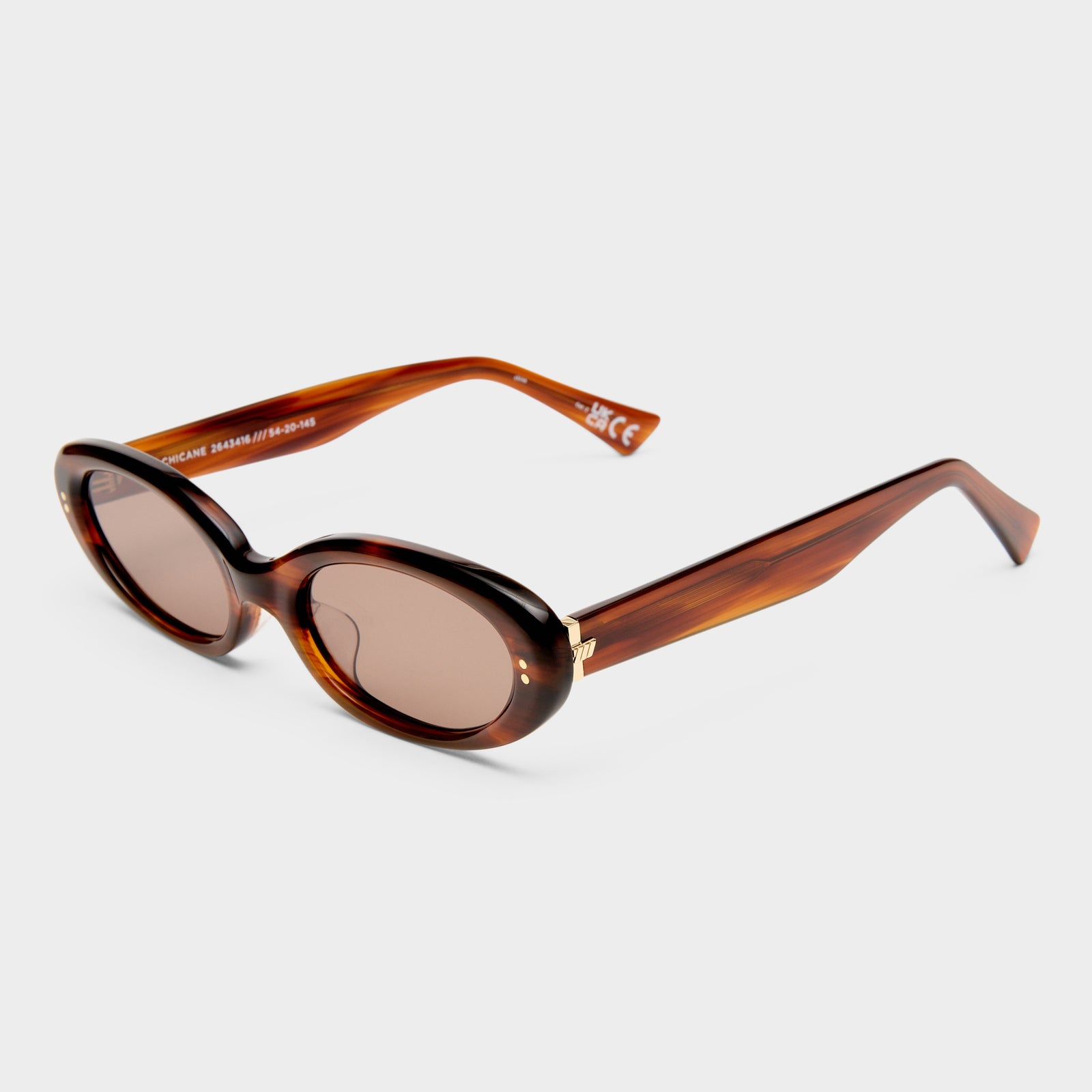 Chicane Brown Haze Female Oval Sunglasses | Le Specs