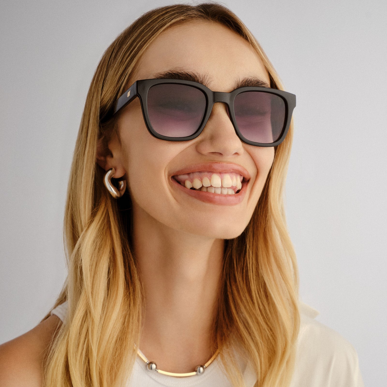 Elixir Black Female Square Sunglasses | Le Specs