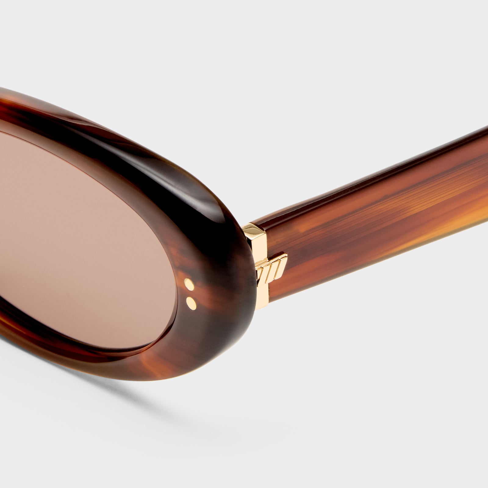 Chicane Brown Haze Female Oval Sunglasses | Le Specs