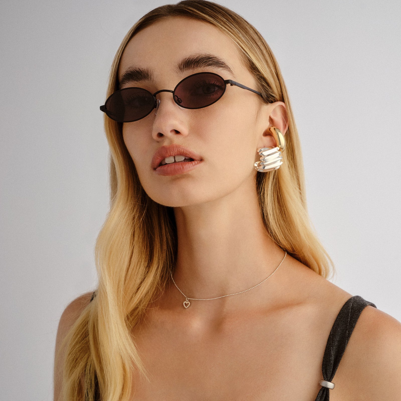 Love Train Matte Black Female Oval Sunglasses | Le Specs