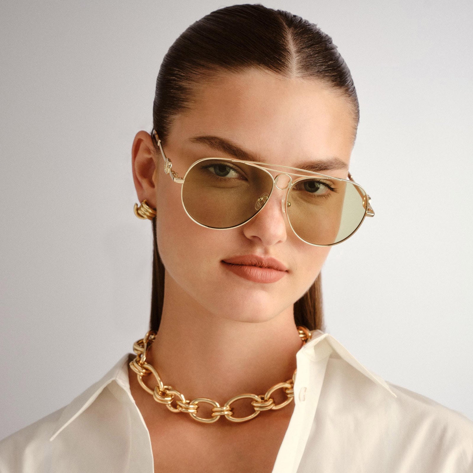 Abracadabra Bright Gold Female Aviator Sunglasses | Le Specs